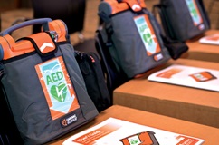 Several AED devices and user guides.
